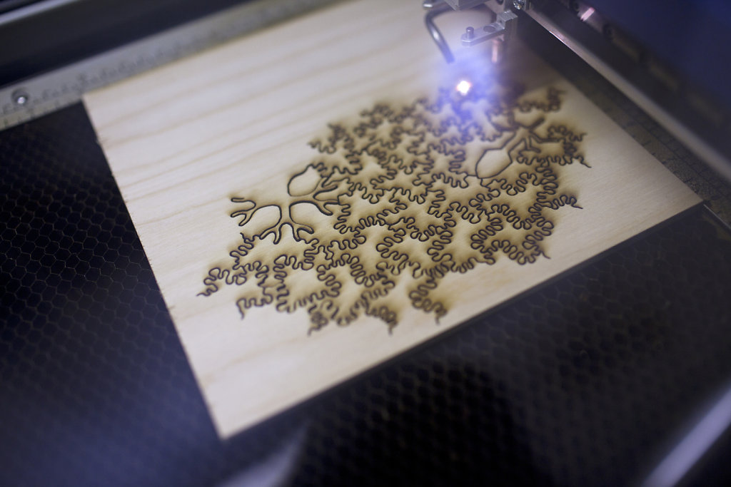 a radial puzzle being lasercut