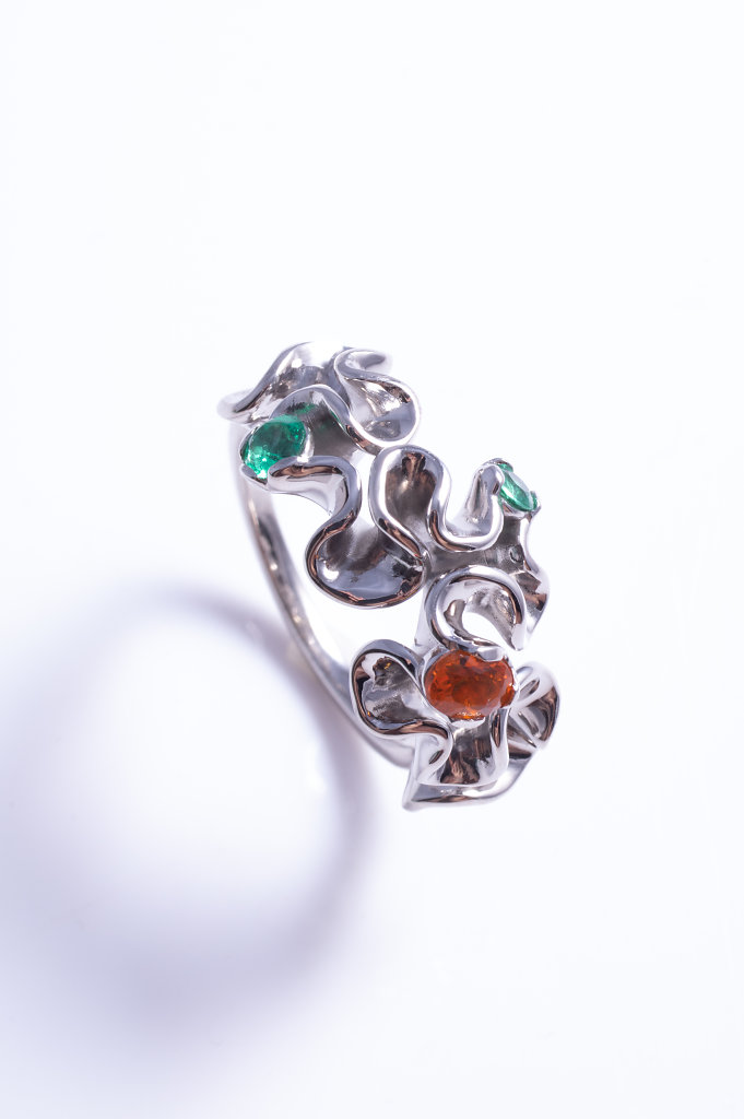 custom florescence ring with fire opal and emerald