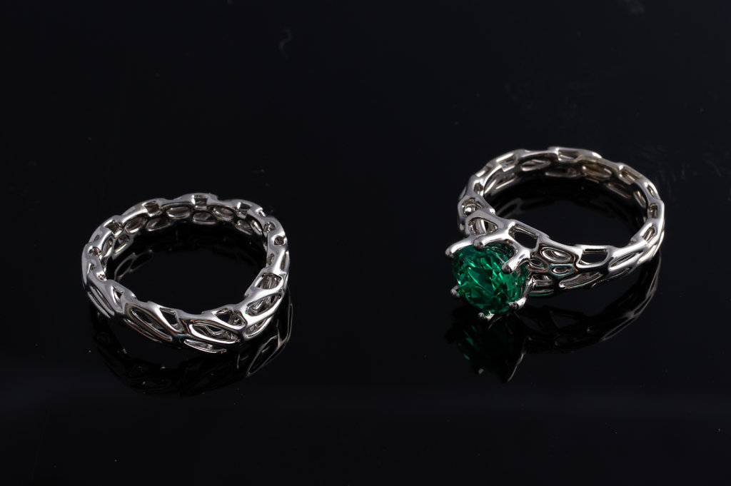cell cycle engagement ring with emerald