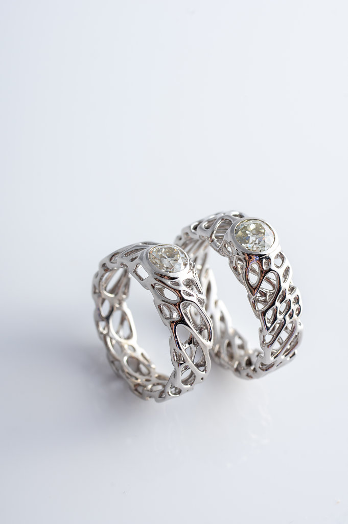pair of custom cell cycle engagement rings