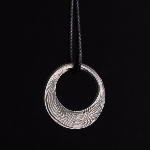 Reaction Mobius necklace - stainless steel