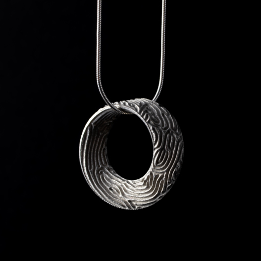 Reaction Mobius necklace - stainless steel